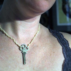 Bead necklace with key